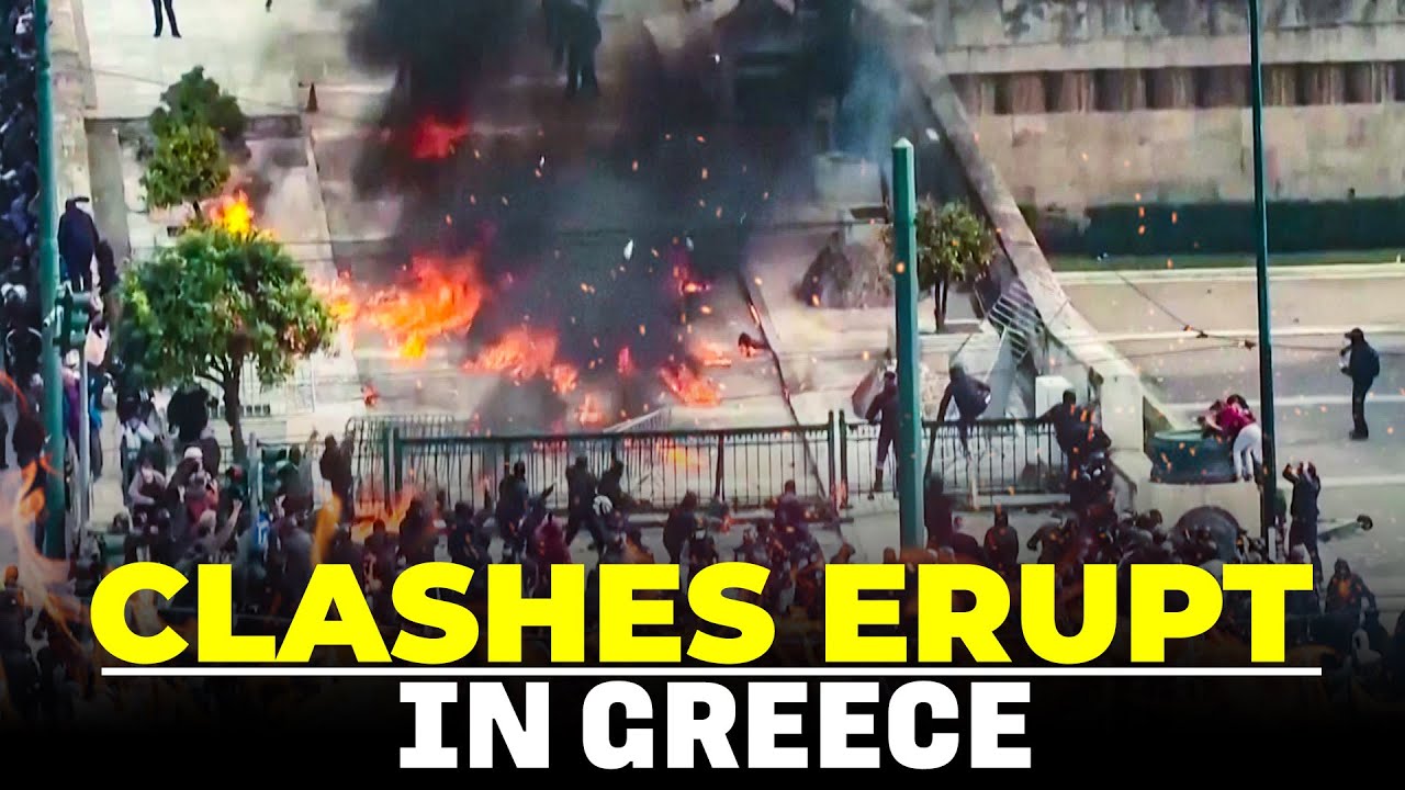 Protesters throw petrol bombs during clashes at train crash protest in Athens | Greece
